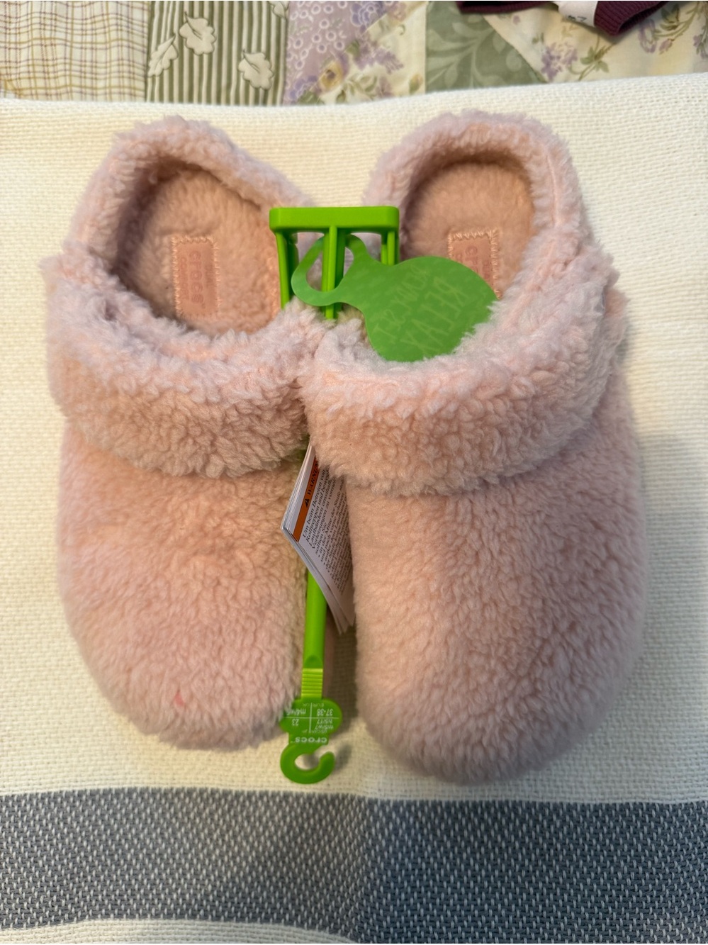 Crocs.  Plush Pink Women’s Slippers - Cozy Fuzzy Comfort